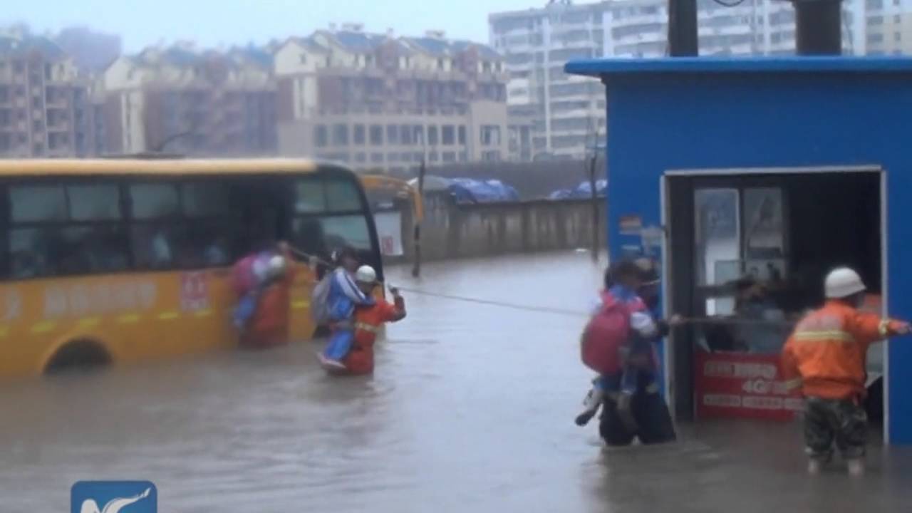 Schoolkids trapped on bus in China, rescued by firefighters