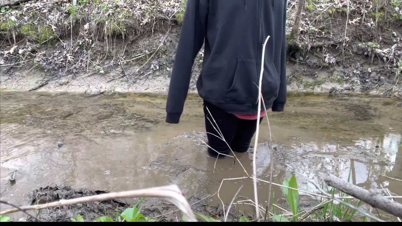 hunter boots in creek quicksand