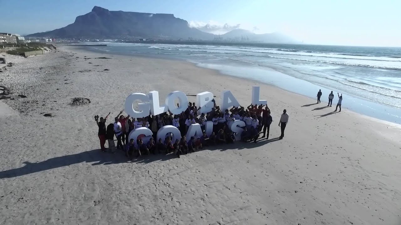 Campaigners welcome new development goals as thousands mobilise around the world