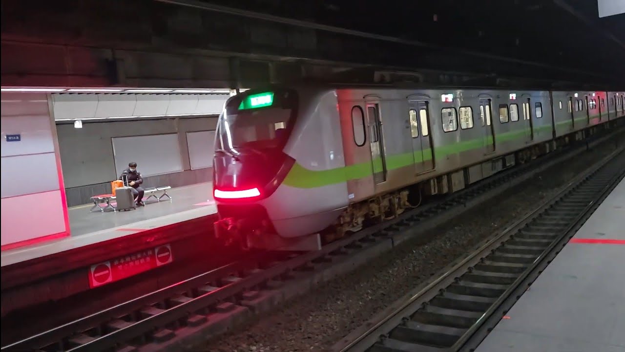 1222次新竹發車經由西部幹線開往基隆的銀綠色微笑號EMU900型十輛一編組EMU938區間車