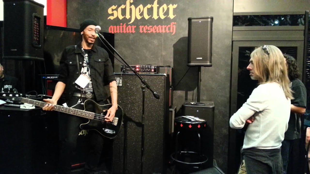 Dug Pinnick at the Schecter booth with Rex Brown checking out his amp