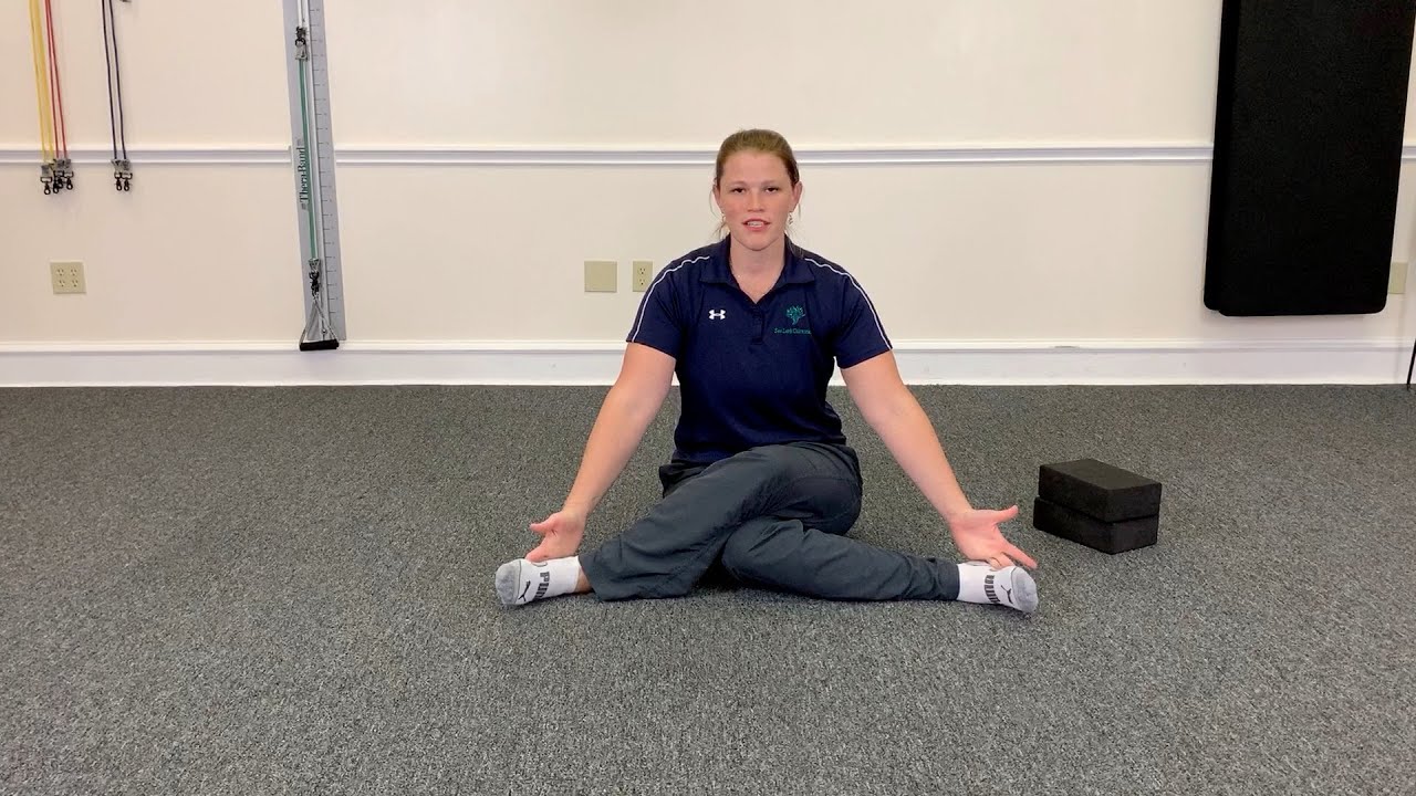 Deep Hip Stretch with Cow face pose and Sea Lark Chiropractic