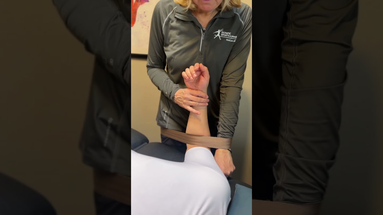 Belt assisted elbow mobilization