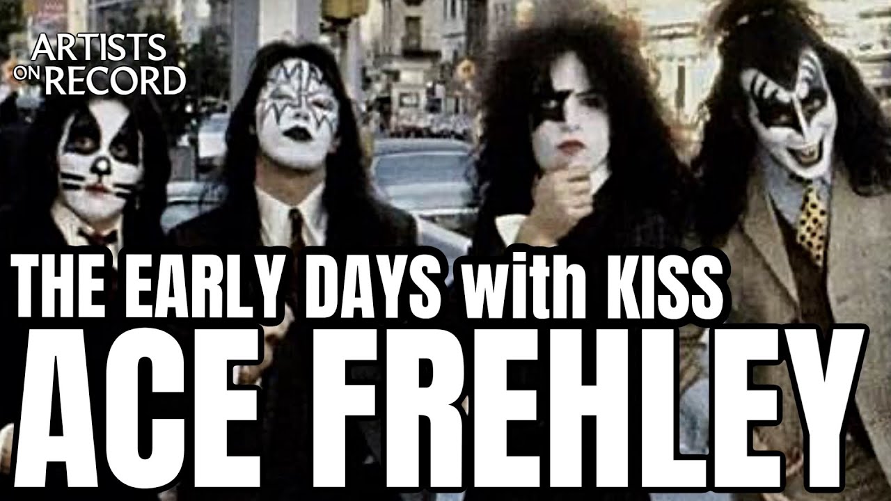 Эйс Фрейли, одетый с иголочки, с группой KISS.