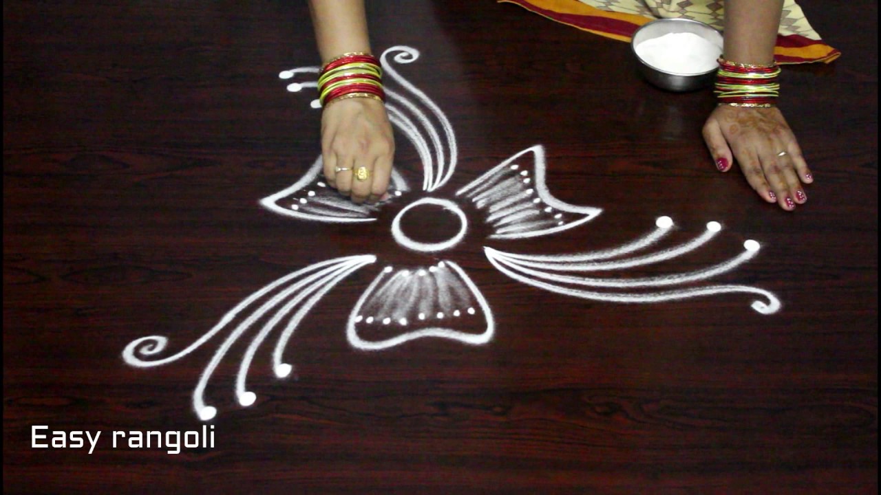 beautiful indian rangoli art designs with out dots || freehand kolam designs - creative muggulu