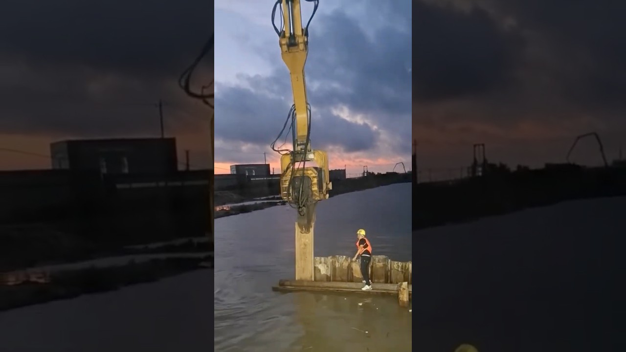 Steel sheet pile installation process in the river