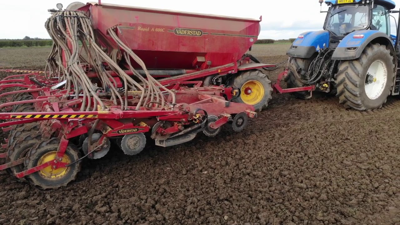 1000 HP of New Holland Tractors drilling Wheat.