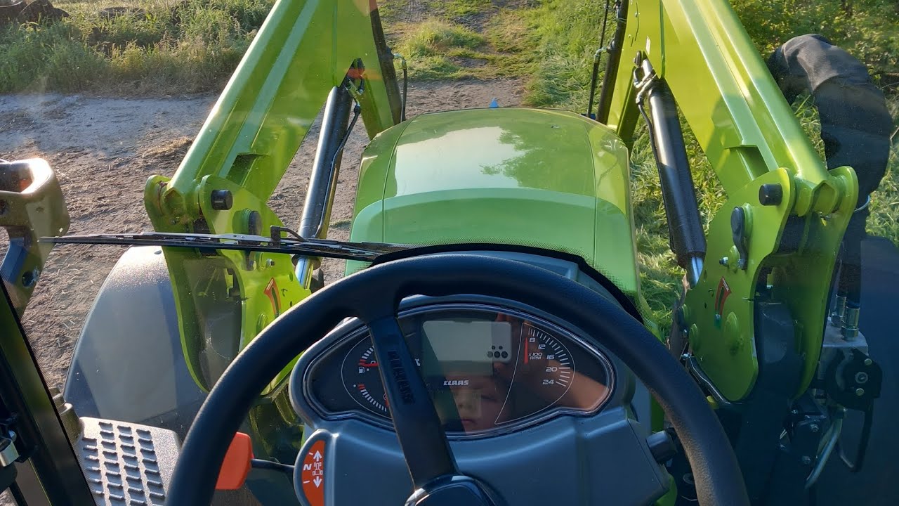 Ballen fahren mit dem Claas arion 450