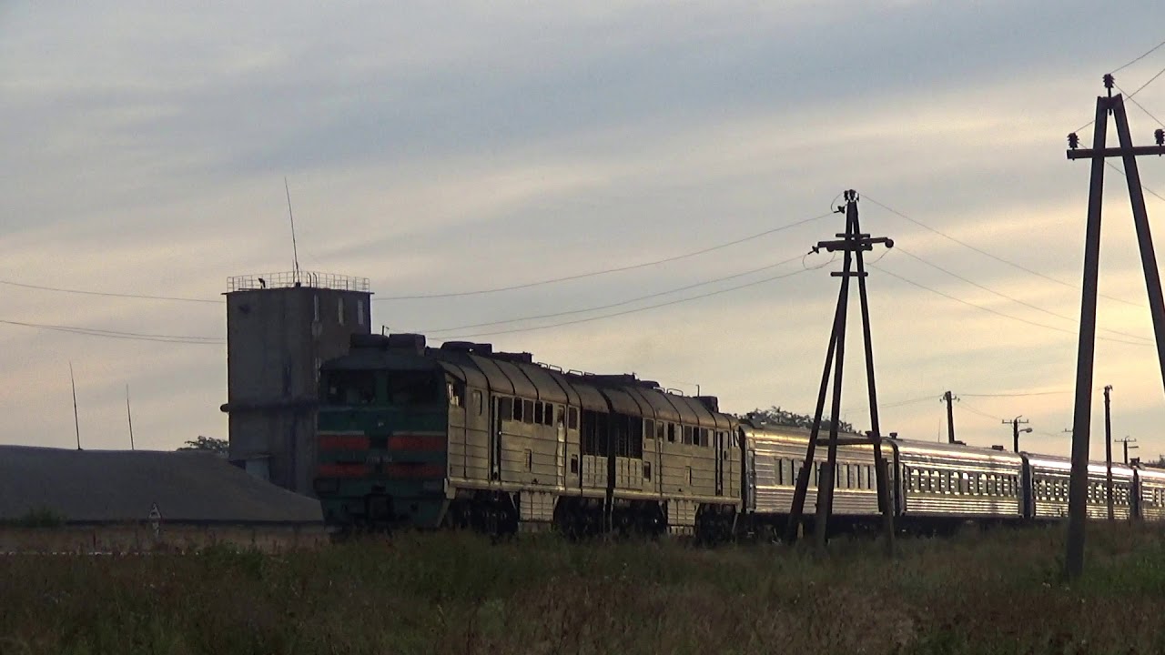 2ТЭ116-1154 с пассажирским поездом Харьков - Бердянск отправляется со ст.Верхний Токмак-1