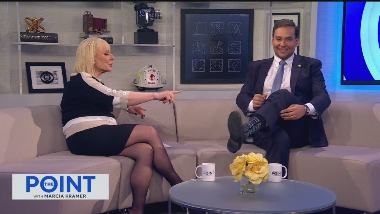 Exclamation Point: George Santos shows off his socks