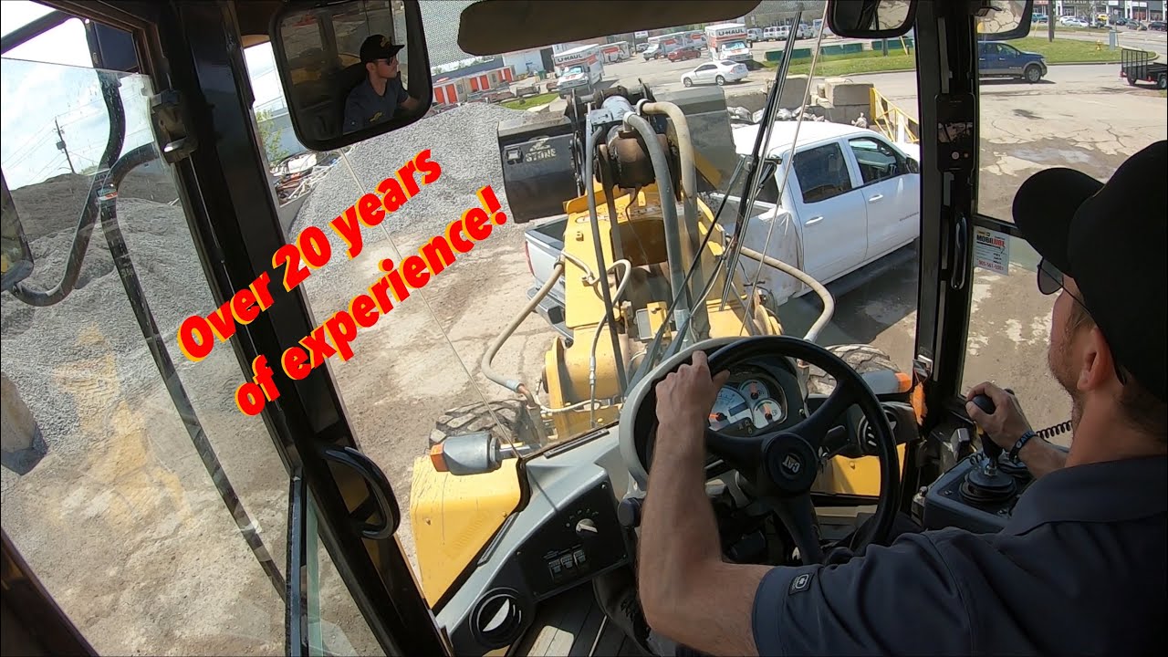 Caterpillar 924G hard at work on a busy day. POV