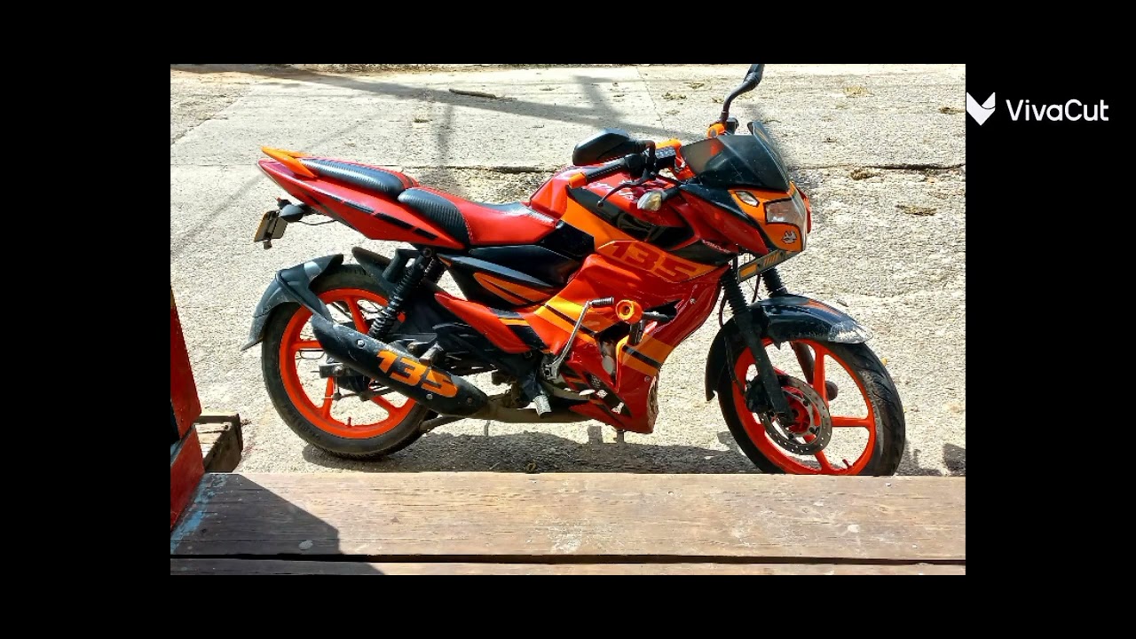 moto personalizada pulsar Ls 135 con pechera