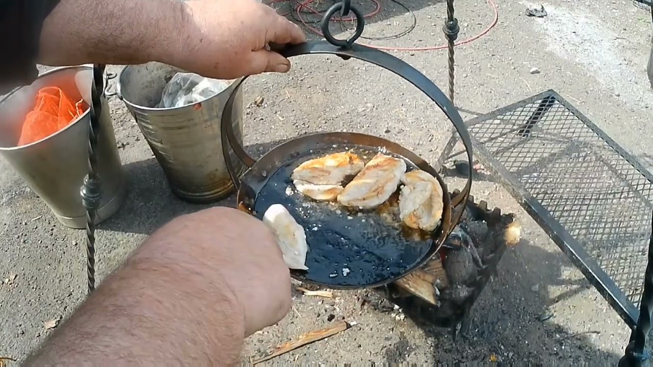 gypsy cooking on a open fire