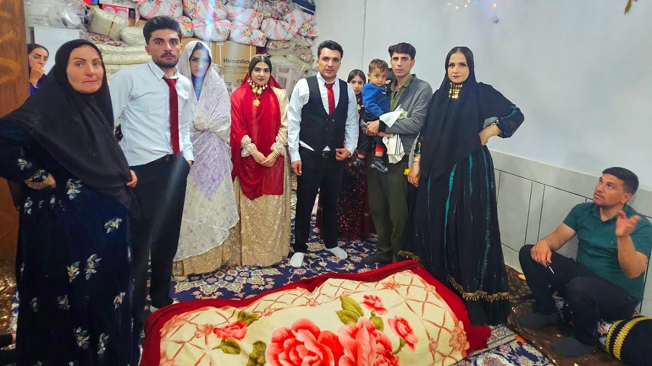Zahra and Ariyamehr at their wedding celebration together with Milad