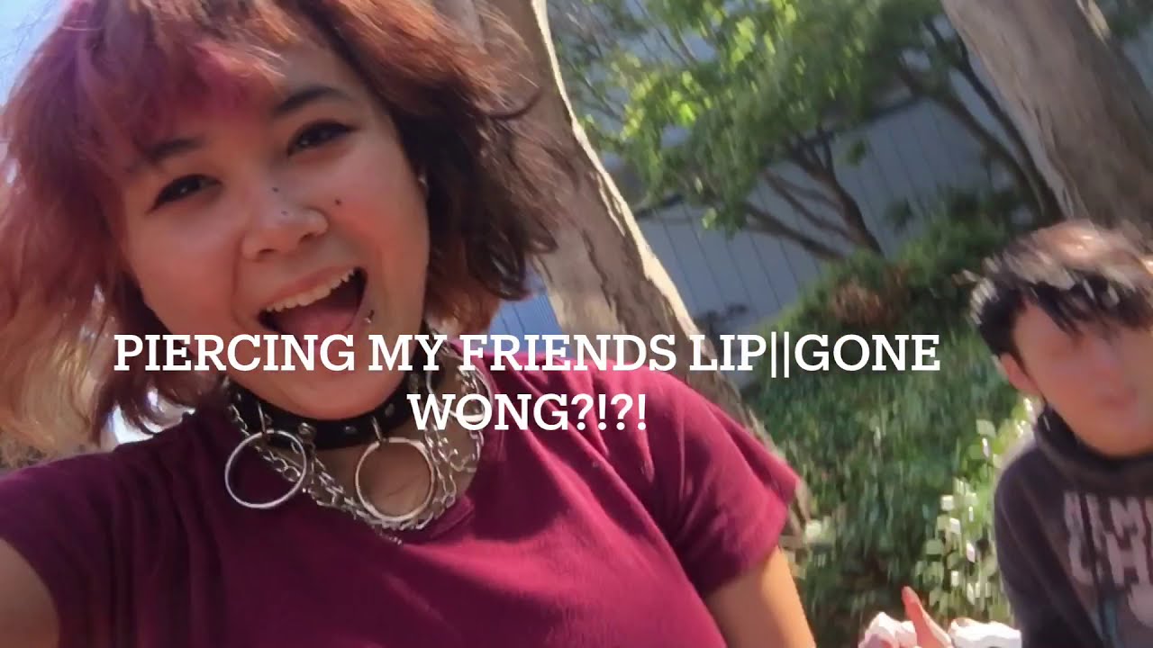 Piercing my friends lip || just Some friends messing around honestly