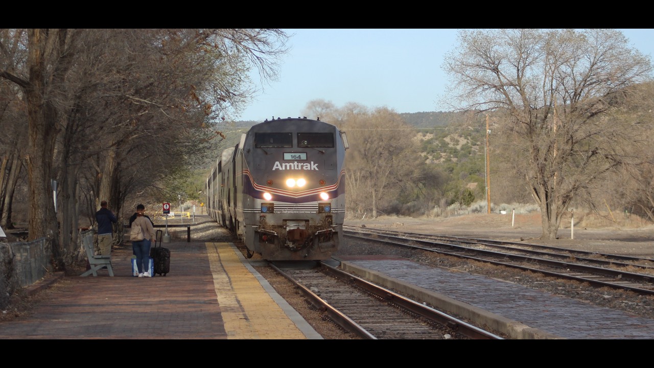 Amtrak #3 the WB Southwest Chief with P42DC #164 leading arrives and departs from Lamy New Mexico.