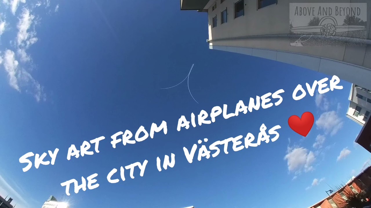 Sky art from real airplanes making skywriting hearts in the air.