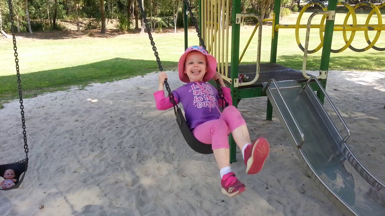 Before: Mia on swing