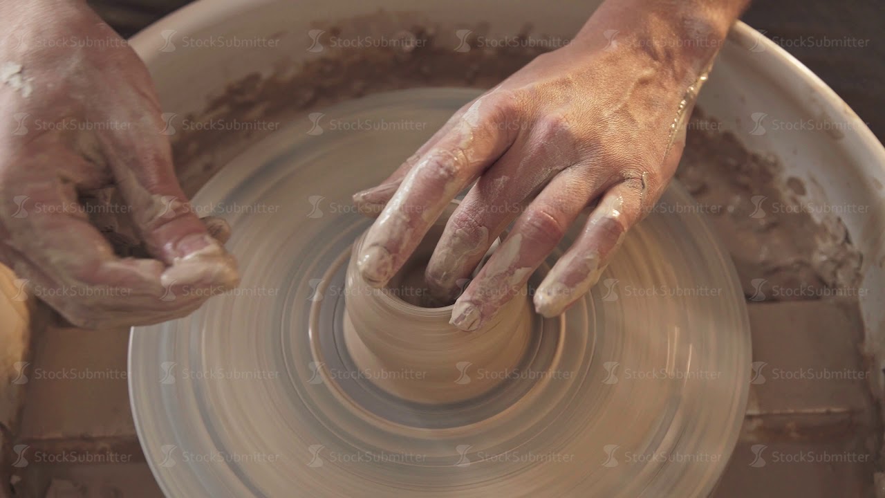 Rotating potter's wheel and clay ware on it vase : taken from above