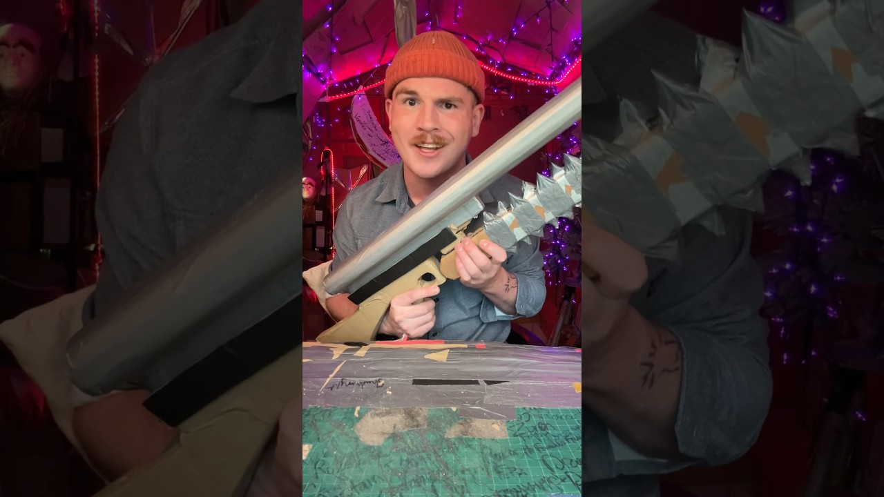 This double barrel zombie gun has a chainsaw attachment.