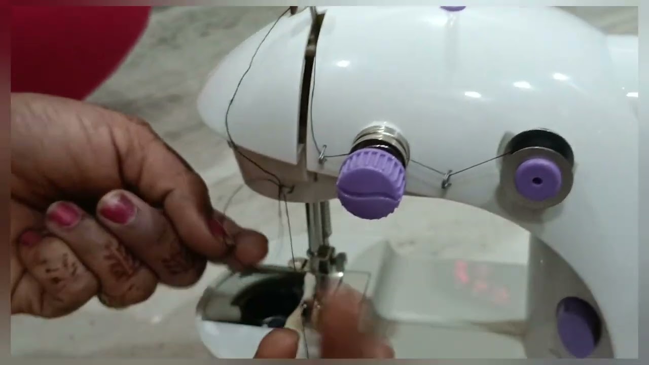 mini sawing  machine లో దారం కట్ అవుతుంది? #howtofix #minisewingmachine #viral #shotviedo