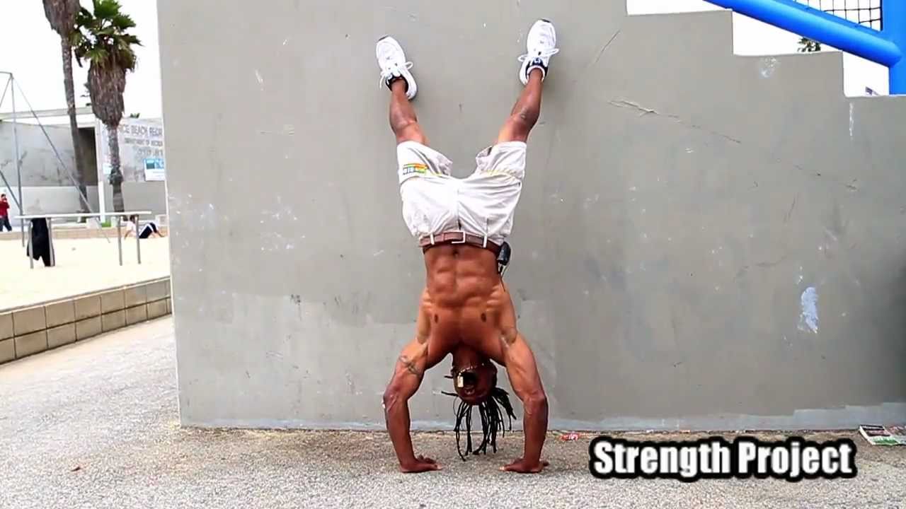 How to do a handstand pushup- advanced hand stand push ups tutorial by Calypso Tumblers