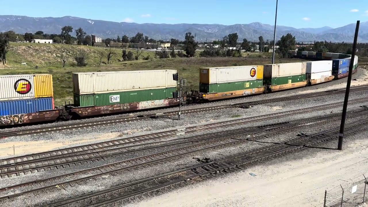 UP 8357 Eastbound Intermodal Stack Meets UP 8664 Westbound Manifest at West Colton Yard.
