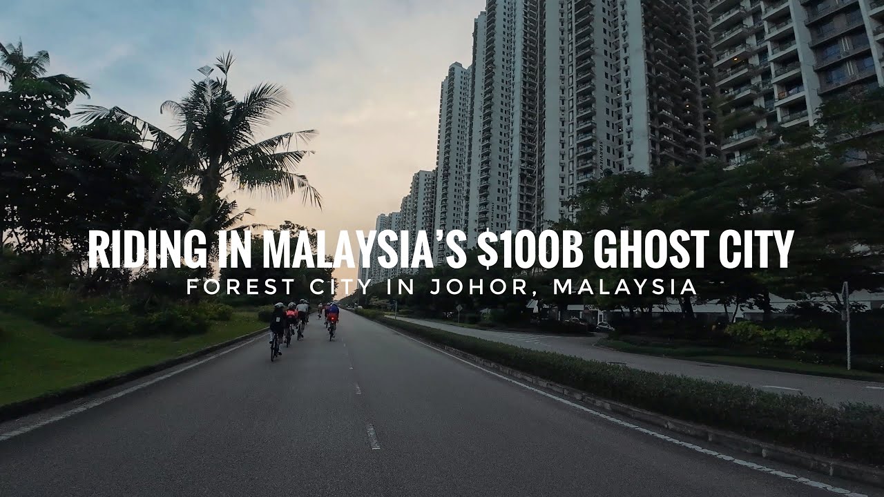 EXPLORING MALAYSIA'S FAILED $100 BILLION GHOST CITY ON OUR BIKES