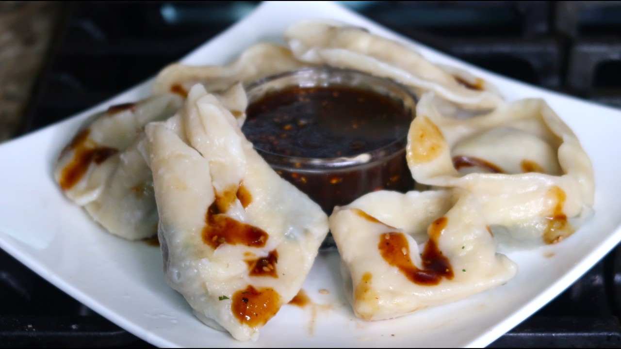 Вареные клецки с начинкой калалу