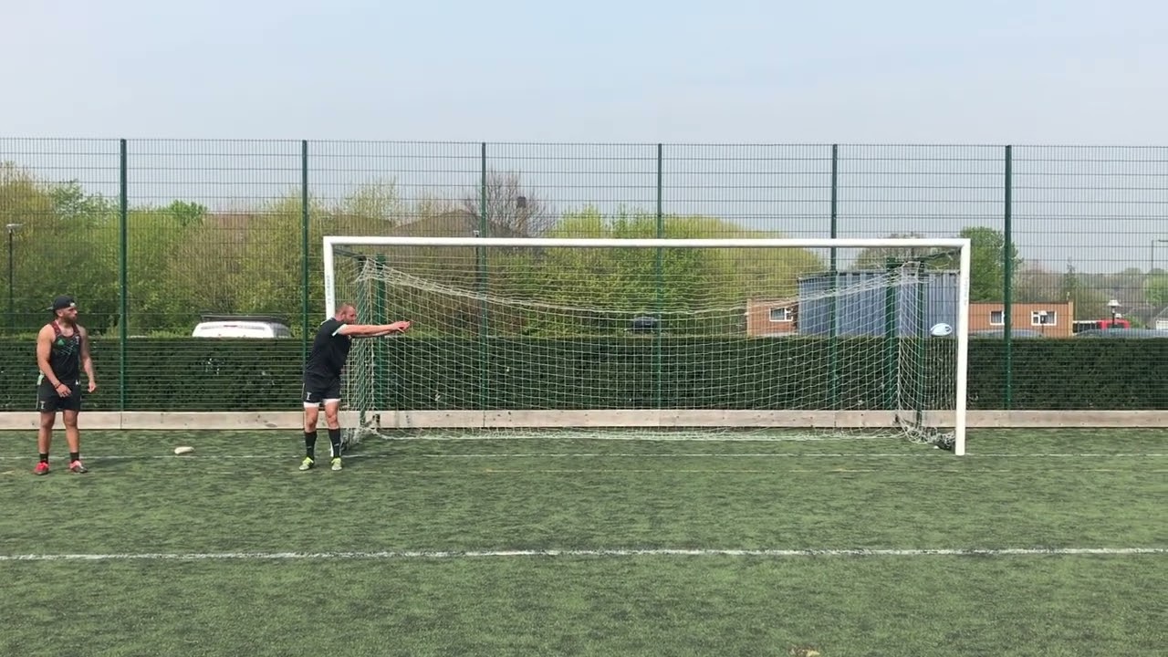 Ross Chisholm of harlequins shows a rugby drill to practise using football posts