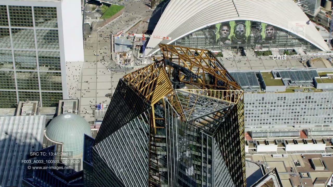 Aerial footage/ The tower Hekla in the business district of Paris La Défense,