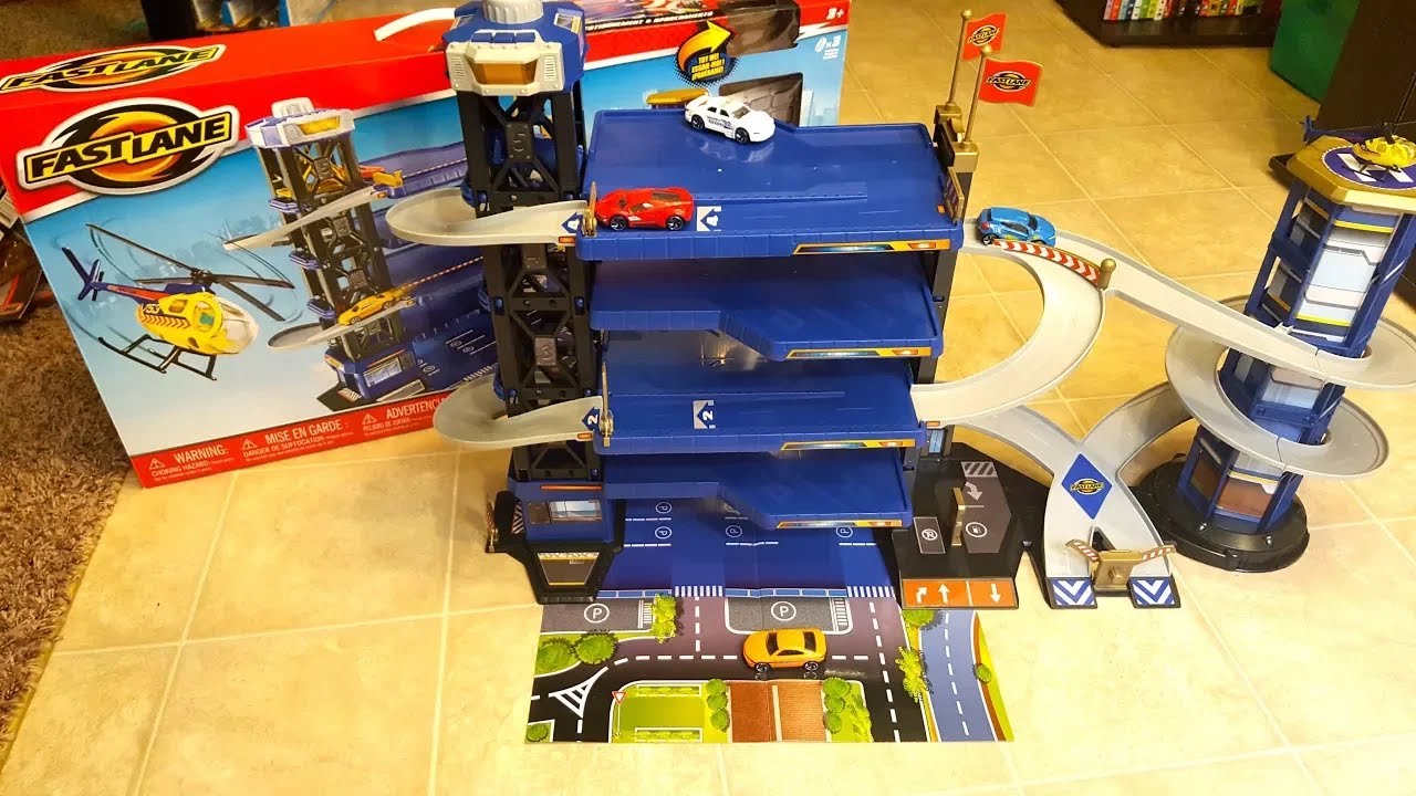 Fast Lane Parking Garage Playset with 5 Levels Car Lift Spiral Ramp Helicopter