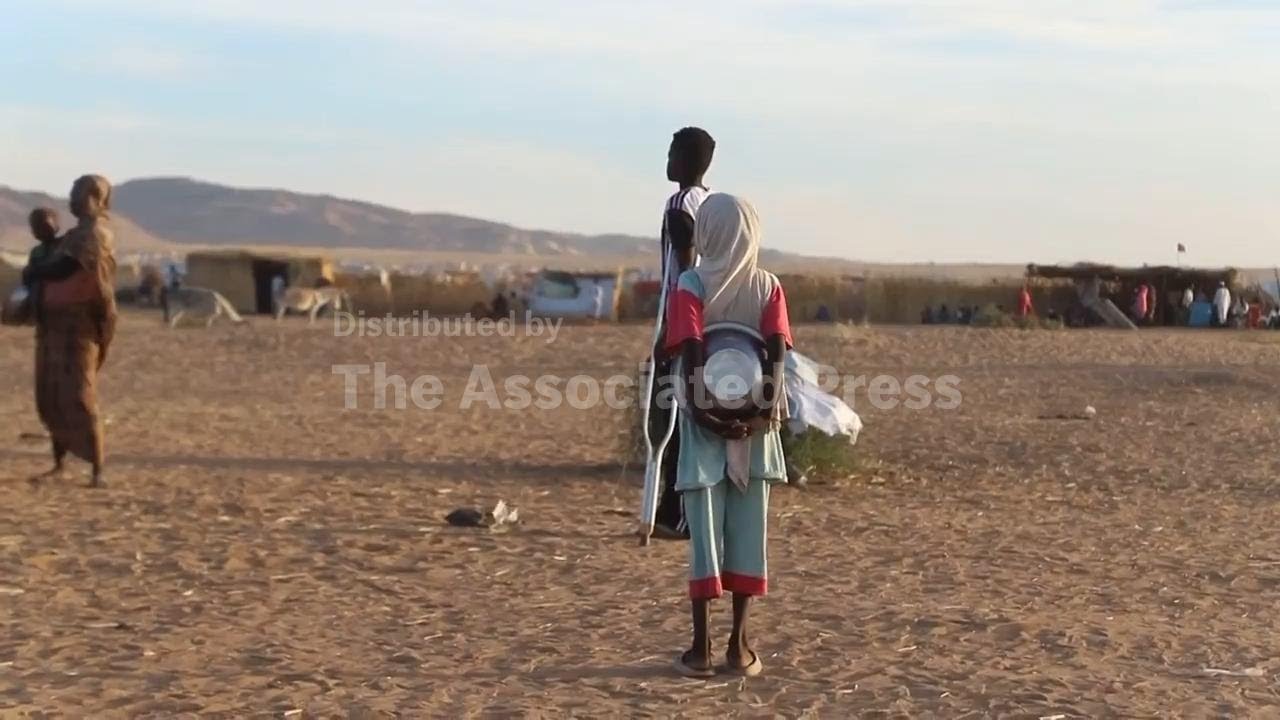 A Sudanese doctor recounts his harrowing escape from a Darfur city under rebel bombardment