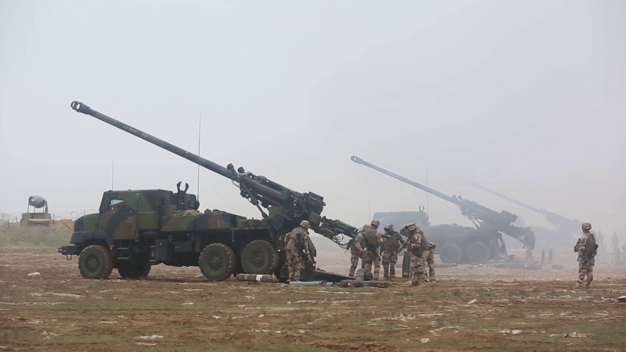 French Army Caesar Self-Propelled Howitzers Firing On Enemy Positions