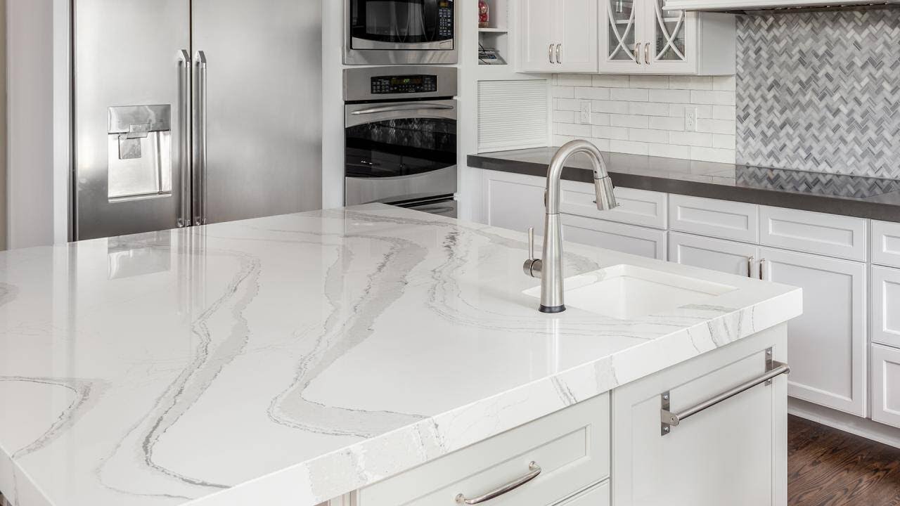 How To DIY Faux Marble Countertops For Under $100, According To a Pro Designer
