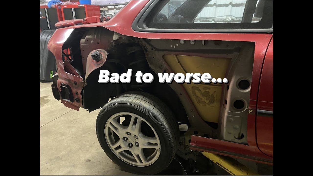 Finding more rust than expected on the rear of the Impreza...