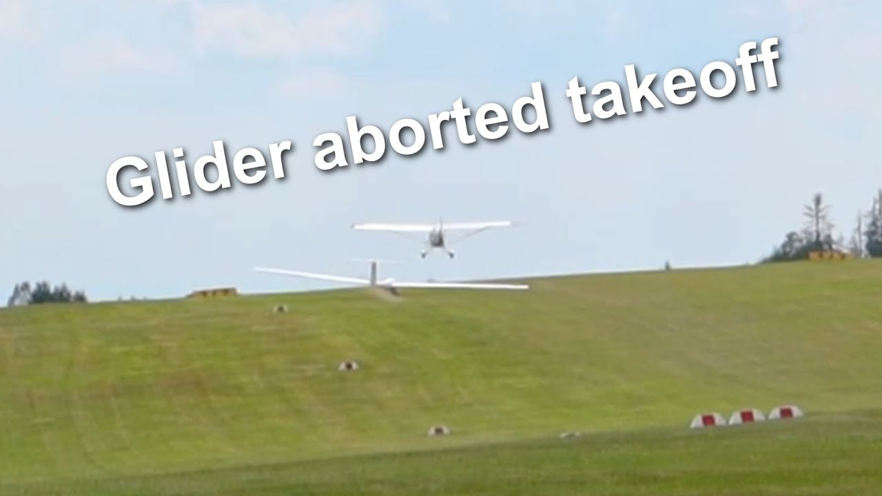 Aborted takeoff of glider Grob Astir CS Jeans towed by Christen A-1 Husky at airport Auf dem Dümpel