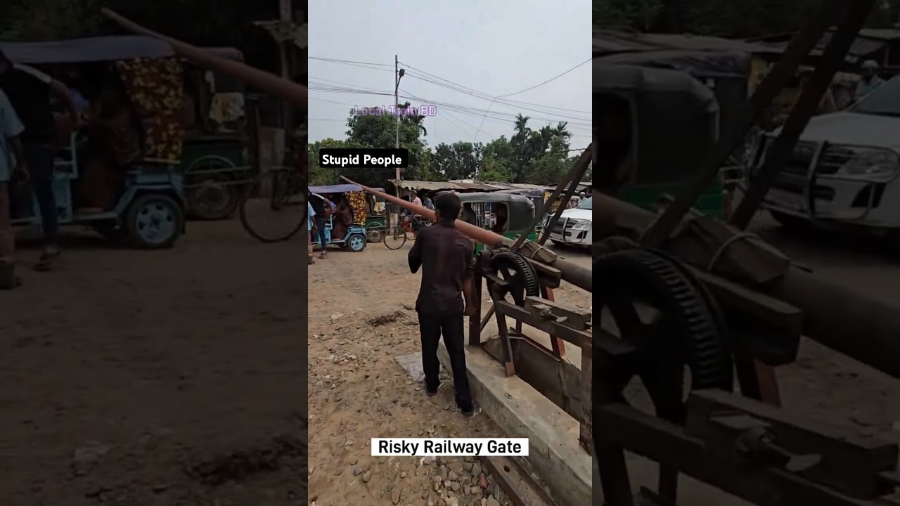 Stupid people at Busy rail crossing gate. 