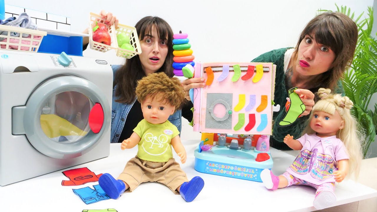Kız oyunları. Sevcan ve Ümit Baby Born oyuncak bebekler ile sihirli kitap. Bebek videoları