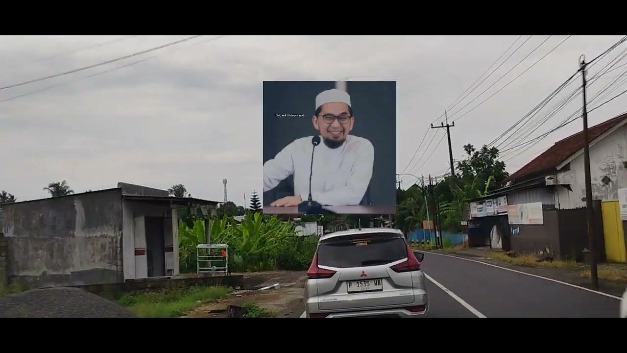 Menikmati pemandangan jalan raya sambil dengarkan ceramah ustad Adi Hidayat