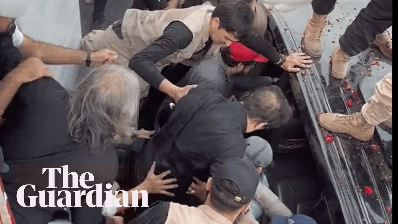 Imran Khan lifted into car after &lsquo;assassination attempt&rsquo; in Pakistan
