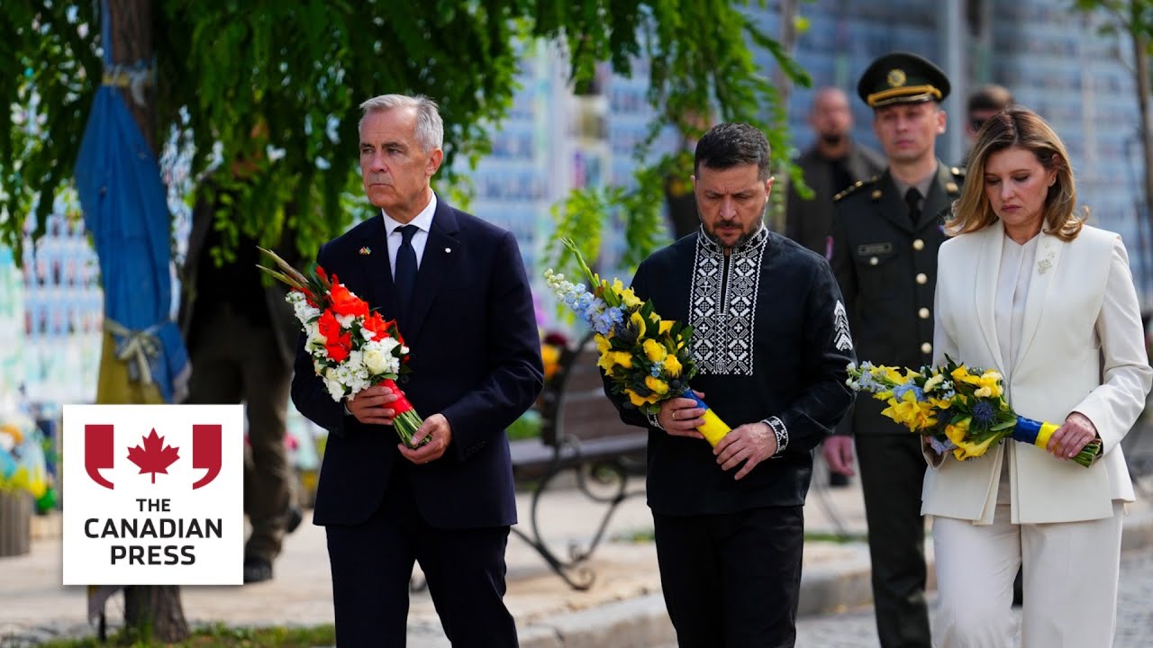 Carney lays flowers alongside President Zelenskyy during surprise trip to Ukraine