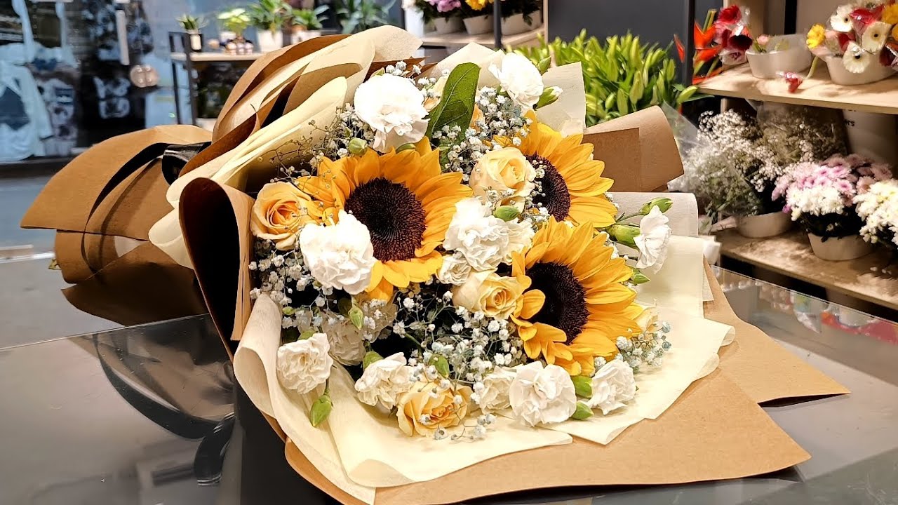 Flower bouquet making with paper#sunflower flower bouquet#Rose flower #how to make sunflower bouquet