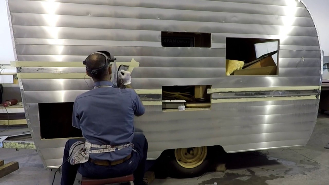Polishing a Shasta Canned Ham Trailer