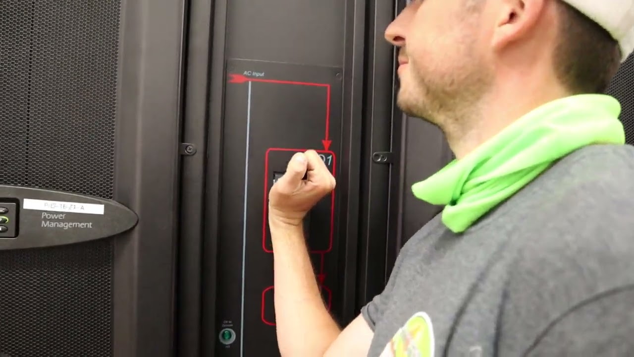 Turning the Schneider Electric Symmetra PX 100 UPS system back on from maintenance bypass