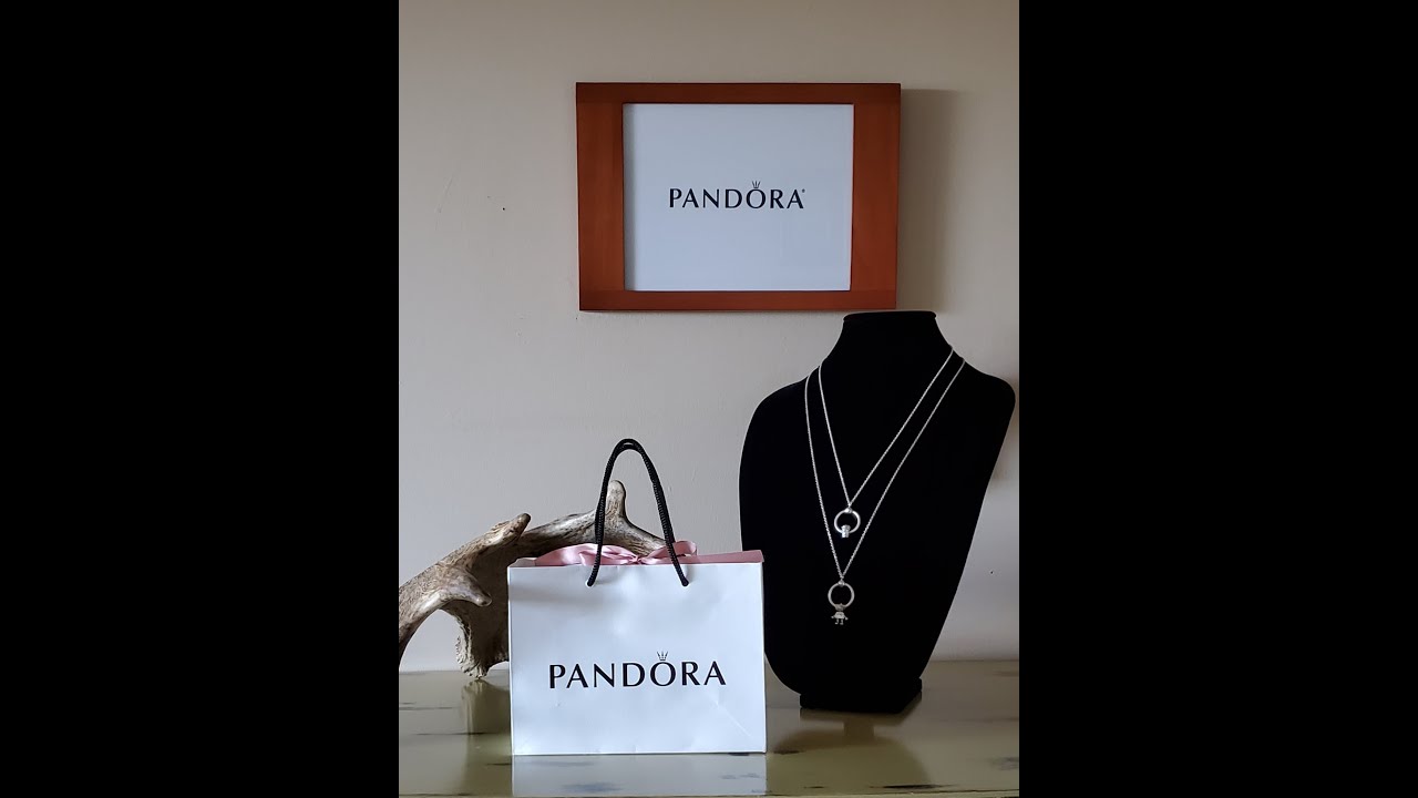 Pandora unboxing!  T-bar bracelet, heart treble clef, pink travel bag, O charm, and heart dangle.