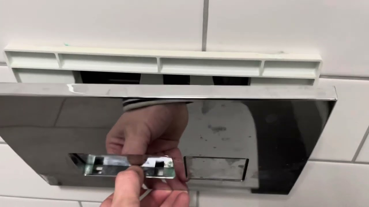 How to remove a flush button to a toilet