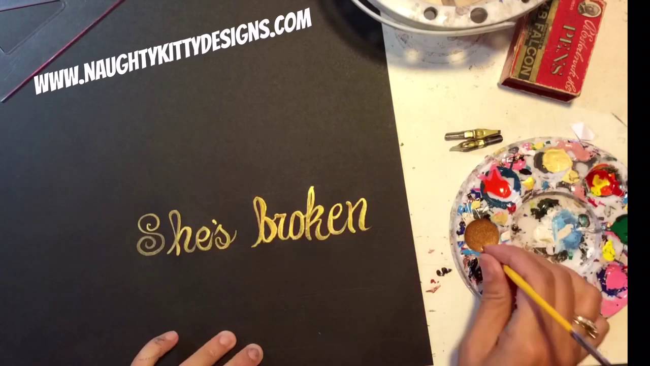 Bit of scripture / calligraphy  in gold ink