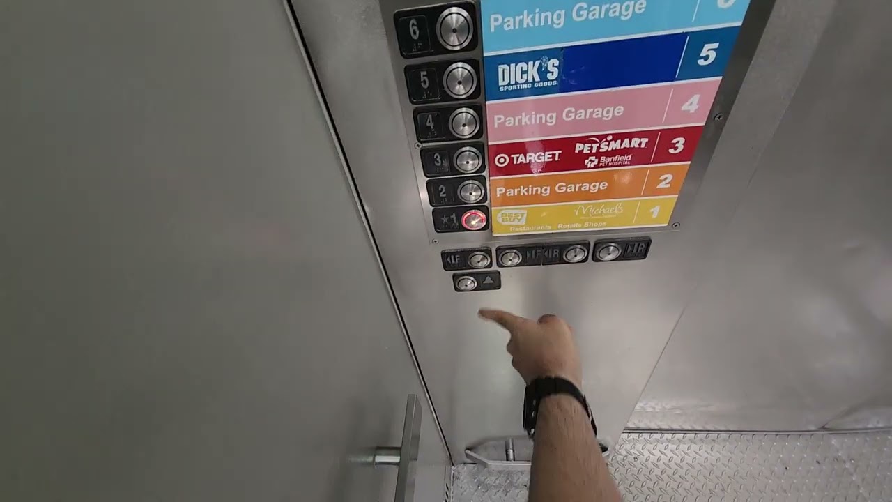 DOWN ONLY. Schindler Traction Elevators at the Dadeland Station in Miami FL.