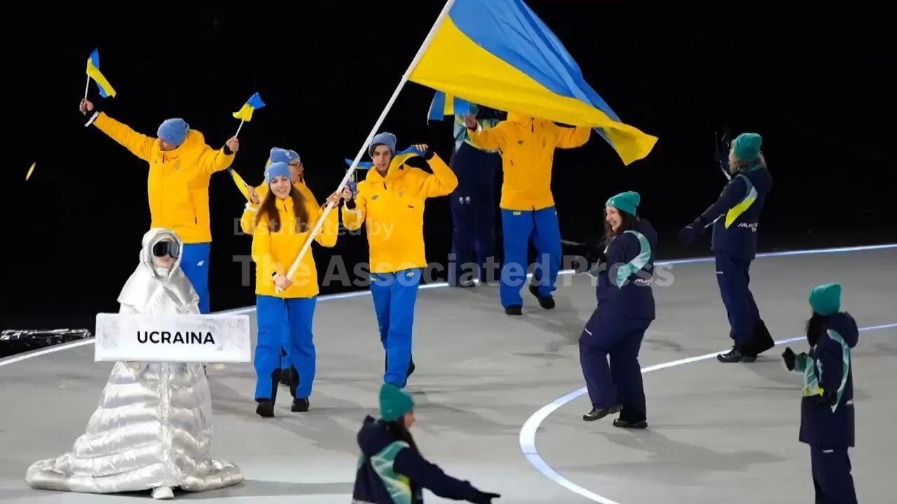 Russian woman carried Ukraine placard at Winter Olympics opening ceremony in show of support